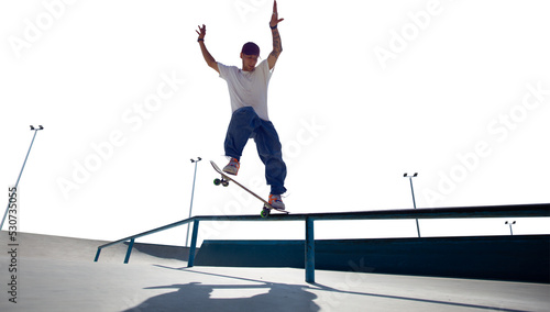 Obraz na płótnie Skateboarder doing a trick isolated on white background