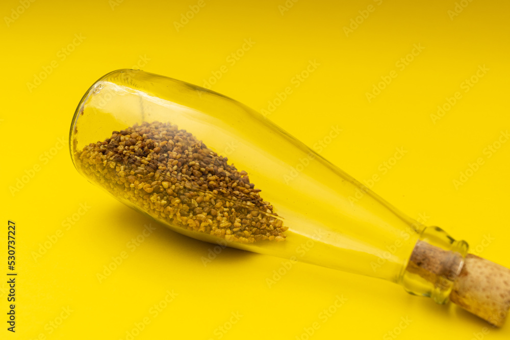 Fototapeta premium Useful buckwheat tea in a glass bottle