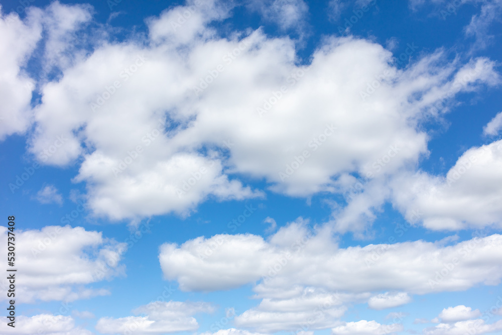 White clouds against the blue sky. White clouds against the blue sky.