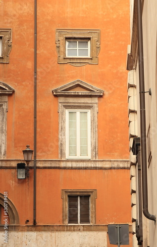 Rome Street View with Typical Orange Brown Building Facade Close Up, Italy