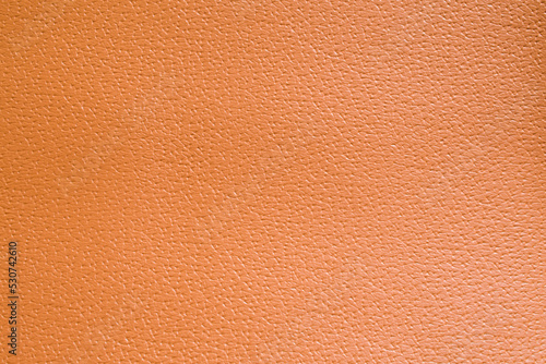 Genuine leather texture background. Brown artificial leather leather background. © BUSARA