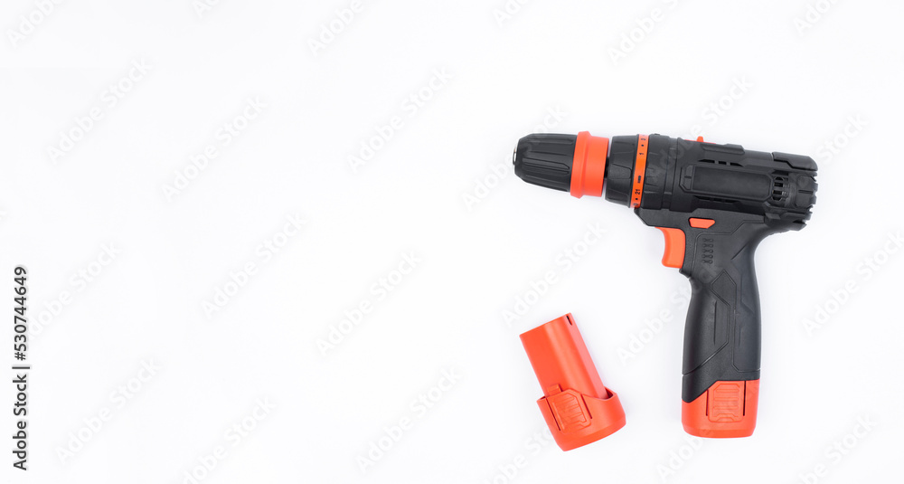 Screwdriver On a white background. Power tool. Isolated. Screwdriver On a white background. Power tool. Isolated.