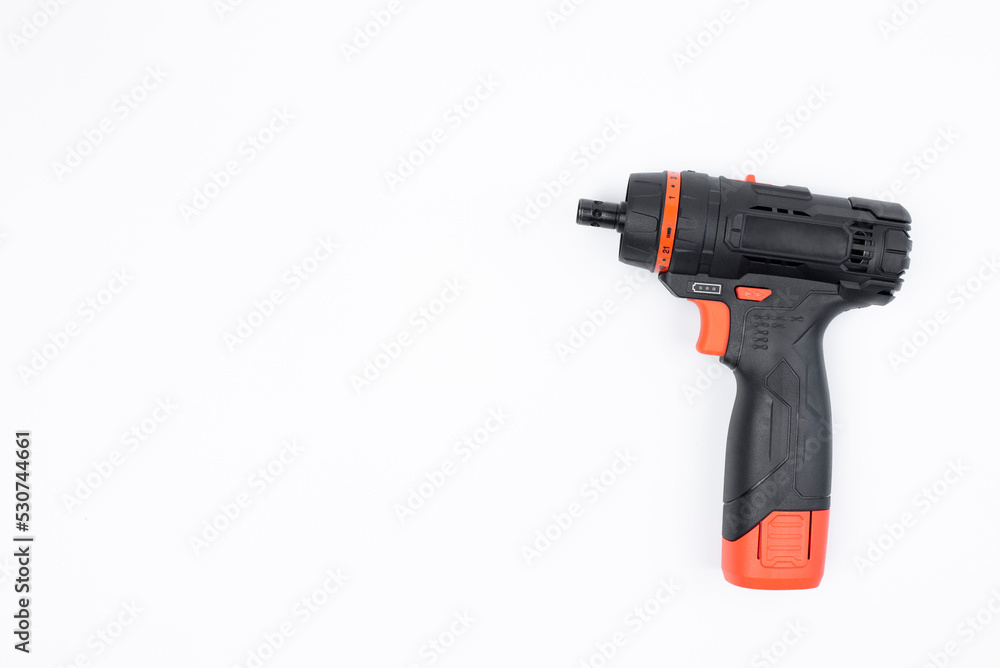 Screwdriver On a white background. Power tool. Isolated. Screwdriver On a white background. Power tool. Isolated.