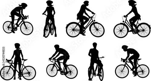 A set of bicyclists riding bikes and wearing a safety helmet in silhouette