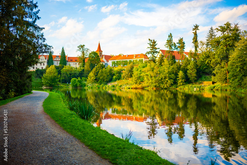 View of Pruhonice castle from the pond in a castle park, Czech Republic 