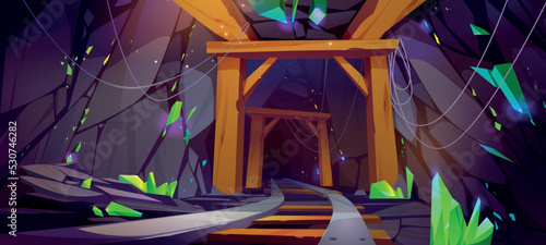 Emerald mine tunnel inside view, cave with railway, green shiny, precious crystal clusters in rocks and stone shaft walls. Cartoon game background, mining quarry landscape, 2d Vector illustration