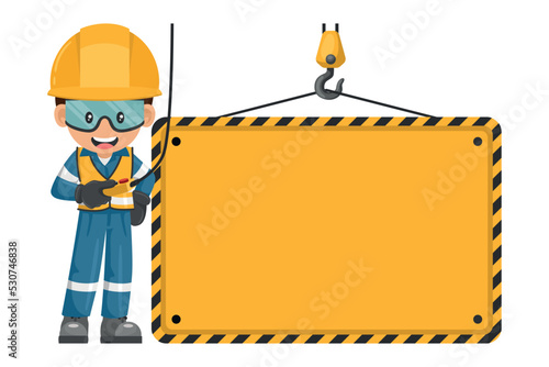 Industrial worker handling overhead crane holding sign with space to copy and paste text. Personal protection equipment. Safety first sign. Industrial safety and occupational health at work