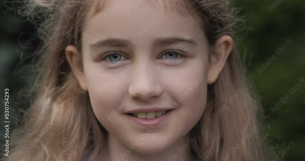 Portrait Smiling Teenage Girl Looking at Camera. Laughs Happily Child at Outdoors. Inquisitive Little Girl Portrait. Face Funny Contemplative Child. Laughing Cute Pretty Schoolgirl Elementary Student. Portrait Smiling Teenage Girl Looking at Camera. Laughs Happily Child at Outdoors. Inquisitive Little Girl Portrait. Face Funny Contemplative Child. Laughing Cute Pretty Schoolgirl Elementary Student.