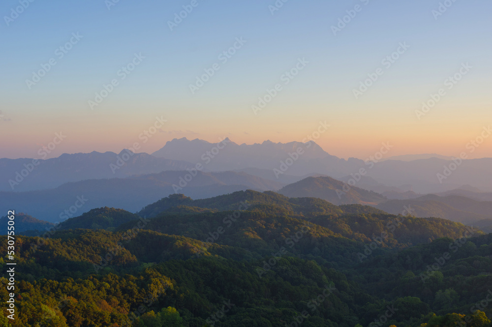 Aerial View of Doi chiang dao mountains in the morning and the sea of mist, Doi Kham Fa. Chiang Mai Province, Thailand. Pink cherry blossom. Aerial View of Doi chiang dao mountains in the morning and the sea of mist, Doi Kham Fa. Chiang Mai Province, Thailand. Pink cherry blossom.