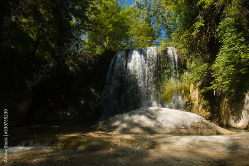 View of waterfall in the forest near Sarnano village, Marche region, Italy