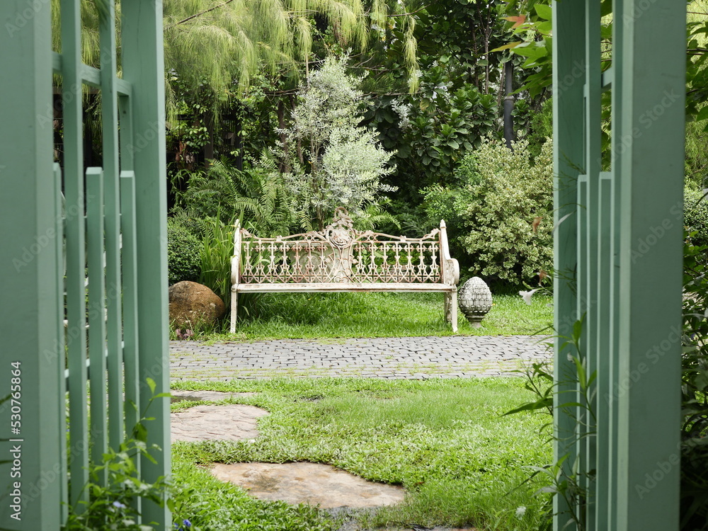garden horse chair. vintage style garden chair placed in the garden