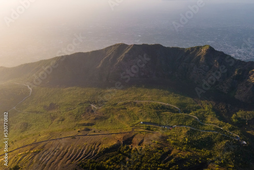 Aerial view of Mount Vesuvius crest at sunset, a volcano in Naples, Campania, Italy.