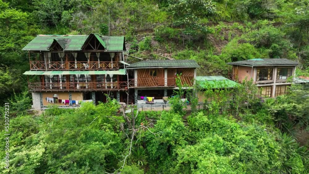 Aerial Drone fly view of a Lodge, Hostal, Camping, hotel, cabana on the trekking route to Machu Picchu, Peru. Salkantay trek from Cusco to Machu Picchu in the Peruvian Andes, Peru, South America Aerial Drone fly view of a Lodge, Hostal, Camping, hotel, cabana on the trekking route to Machu Picchu, Peru. Salkantay trek from Cusco to Machu Picchu in the Peruvian Andes, Peru, South America