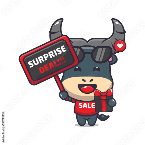 Cute bull in black friday cartoon mascot illustration photo