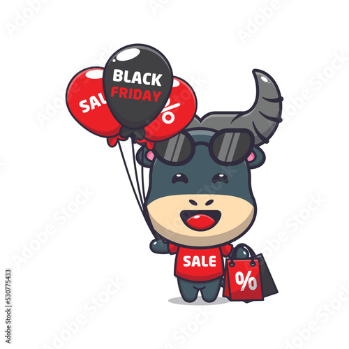 Cute bull in black friday cartoon mascot illustration photo