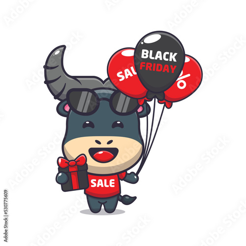 Cute bull in black friday cartoon mascot illustration photo