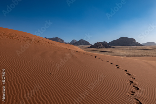 Dunes and patterns in the sand in the Wadi Rum desert, sunny day, Jordan