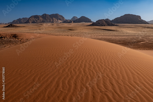 Dunes and patterns in the sand in the Wadi Rum desert, sunny day, Jordan