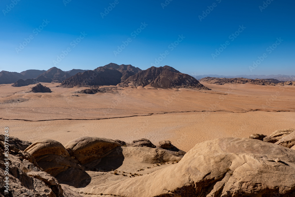 Fototapeta premium Wadi Rum desert and rock formations on a sunny day, Jordan landscapes