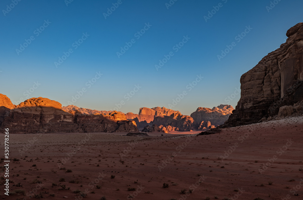 Desert landscape at golden hour at sunset in the Wadi Rum desert, Jordan