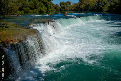 Beautiful natural landmark of manavgat waterfall with waterfall lake landscape near Manavgat city, Turkey photo