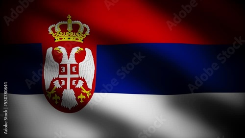 the flag of serbia blowing in the wind as a realistic background	
 photo