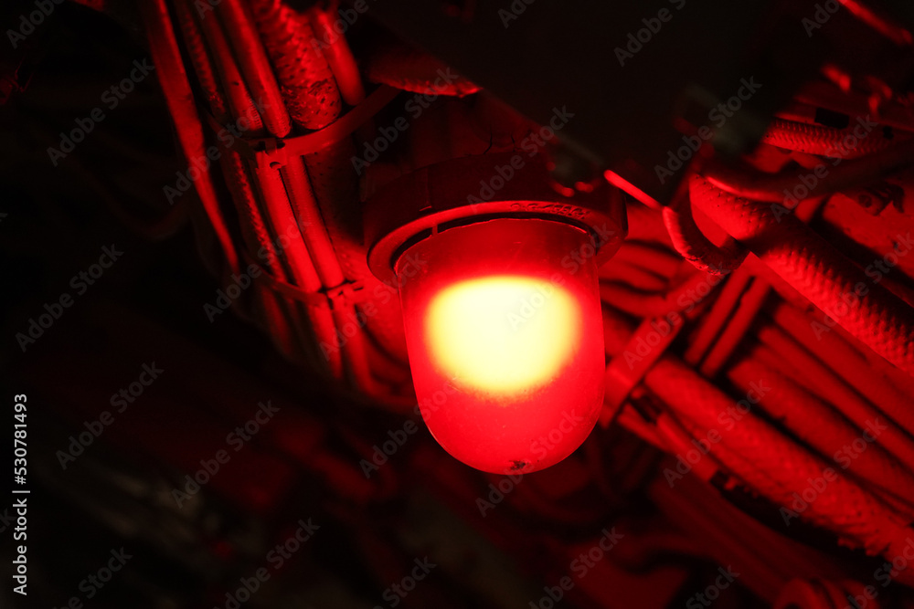 red alarm light lamp Inside military war submarine warship Photos | Adobe  Stock