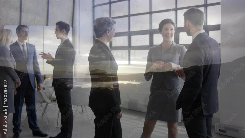 Animation of caucasian business people talking over landscape Animation of caucasian business people talking over landscape