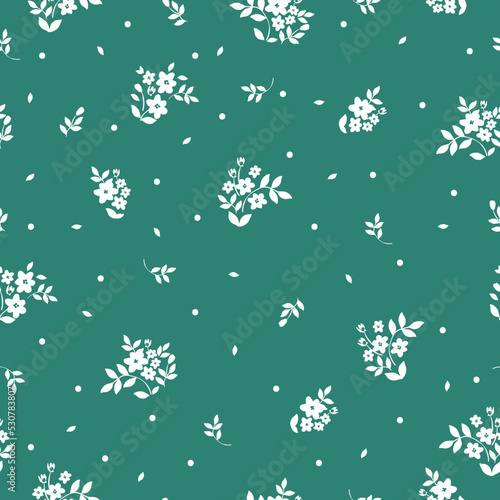Simple vintage pattern. white flowers , leaves and dots . green background. Fashionable print for textiles and wallpaper.