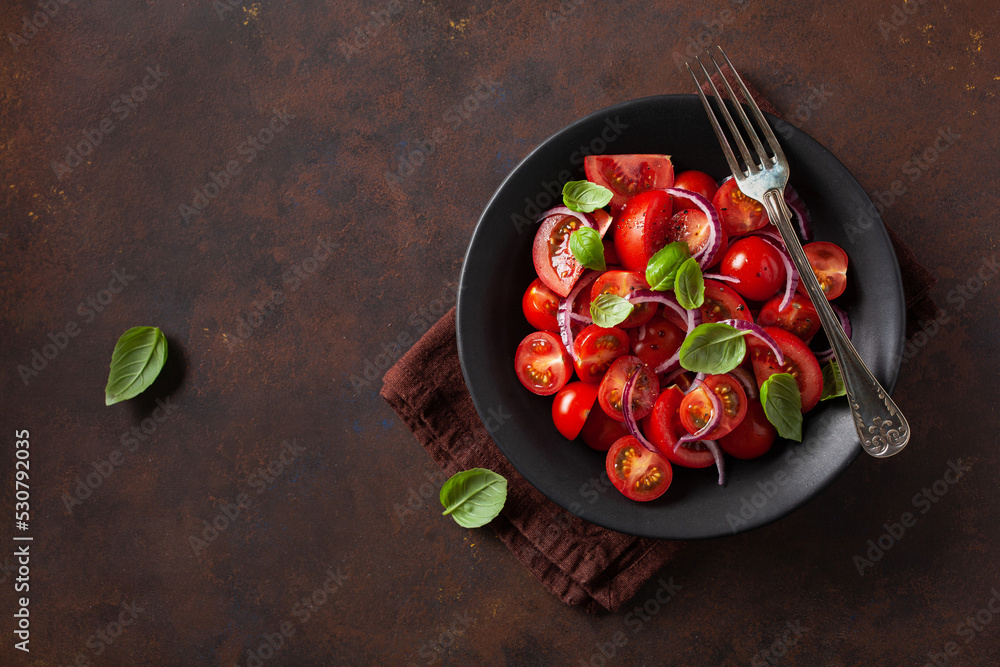 healthy tomato salad with onion basil olive oil and balsamic vinegar