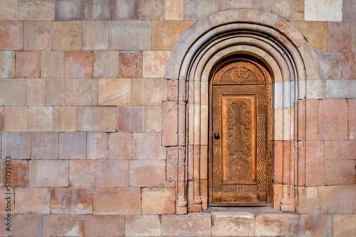 Beautiful Antique Wooden Door in the wall of Noravank Monastery in Armenia © Volodymyr Shevchuk