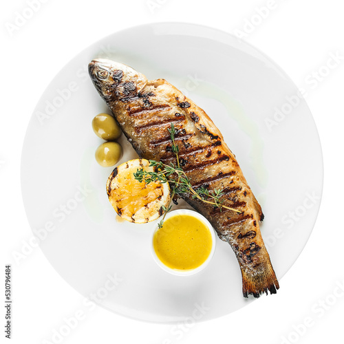 Plate of gourmet grilled sea bass fish
