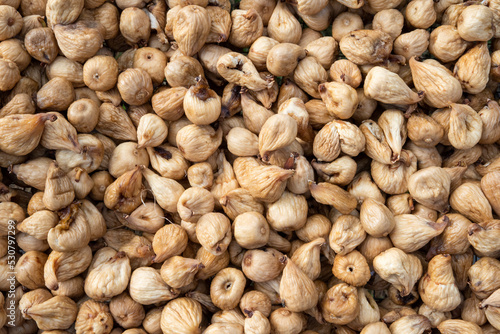 Dried cilento white figs on summer sun light, healthy food bio, organic fruit, traditional italian food