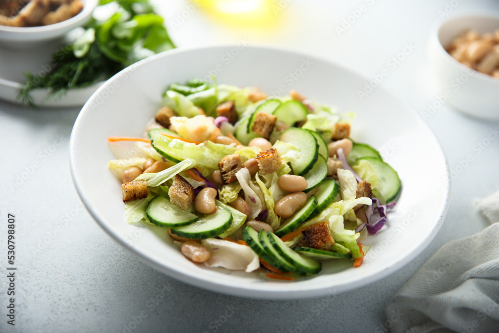 Healthy vegetable salad with white bean Healthy vegetable salad with white bean