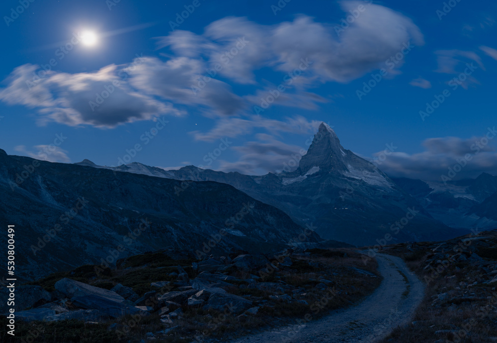 Matterhorn peak seen after sunset over Lake Stellisee, night shots, Zermatt, Switzerland