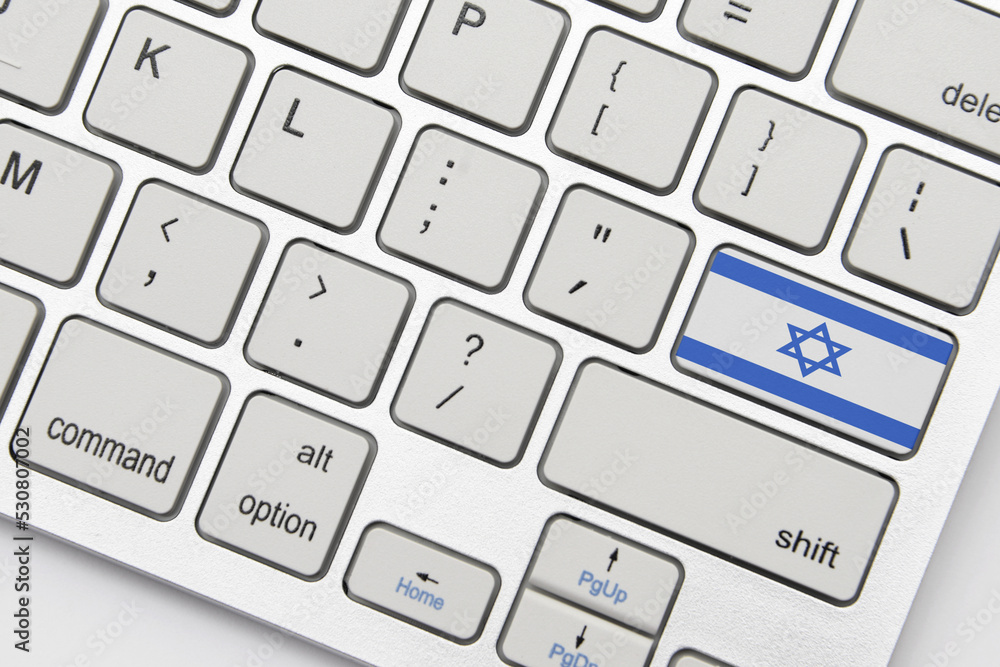 national flag of israel on the keyboard on a grey background .3d illustration national flag of israel on the keyboard on a grey background .3d illustration