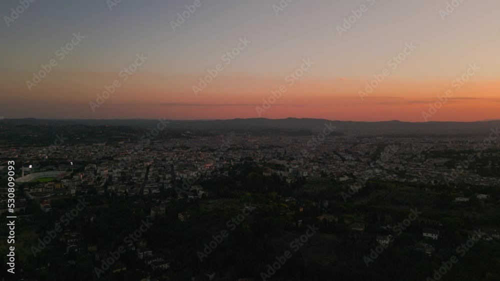Old Florence Firenze city center evening sunset cinematic drone aerial, with famous medieval cathedral duomo in Tuscany, Italy, with Uffizi Gallery, Palazzo Pitti and Michelangelo David, from above. Old Florence Firenze city center evening sunset cinematic drone aerial, with famous medieval cathedral duomo in Tuscany, Italy, with Uffizi Gallery, Palazzo Pitti and Michelangelo David, from above.