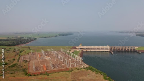drone view of hydroelectric power plant on paranapanema river, artificial lake, transmission station, Brazil photo