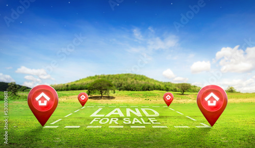 Land plot management - real estate concept with a vacant land on a green field available for building construction and housing subdivision in a residential area for sale, rent, buy or investment.