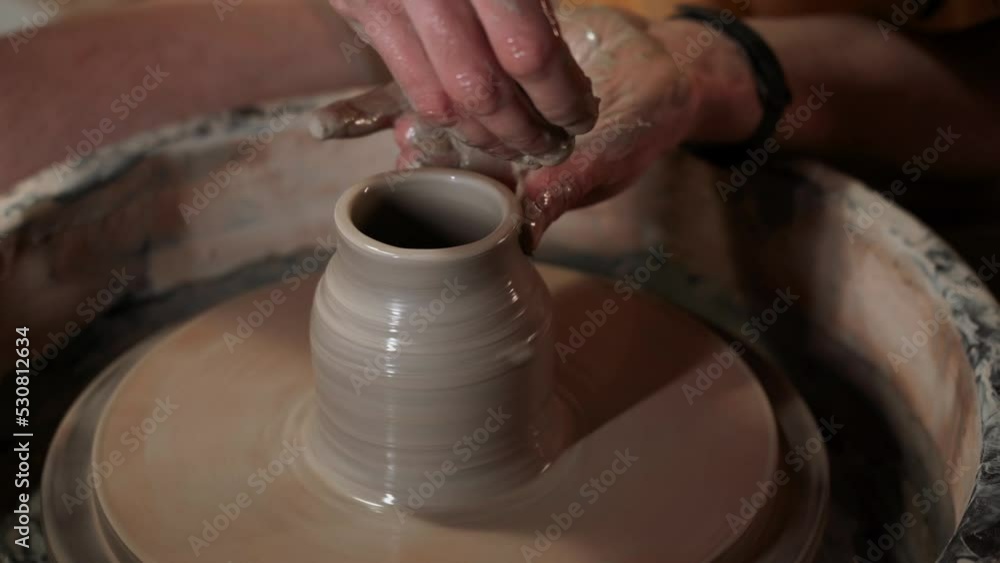 Ceramist working in pottery studio. Ceramists Hands Dirty Of Clay. Process of creating pottery. Master ceramist works in her studio 4k Ceramist working in pottery studio. Ceramists Hands Dirty Of Clay. Process of creating pottery. Master ceramist works in her studio 4k
