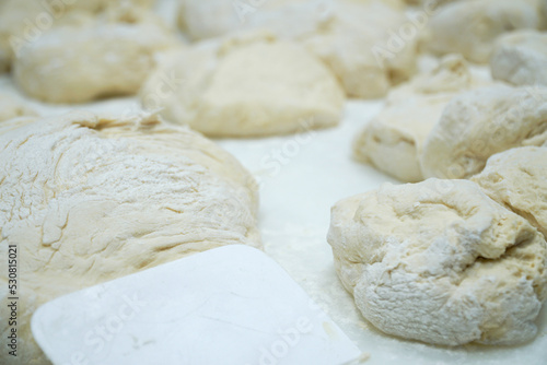 master making dough for bread