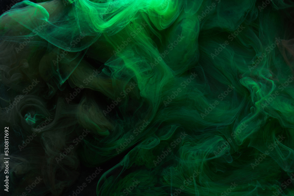 Fototapeta premium Black green smoke abstract background, acrylic paint underwater explosion, swirling ink