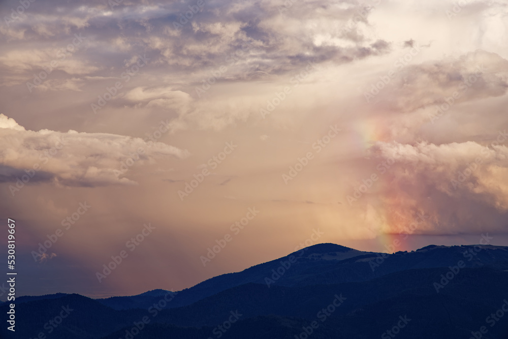 Obraz premium arc en ciel sur la montagne