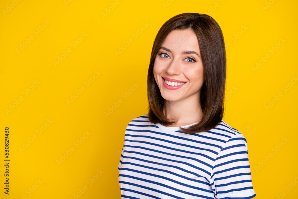 Portrait of pretty adorable gorgeous girl with bob hairstyle wear striped t-shirt toothy smiling isolated on yellow color background Portrait of pretty adorable gorgeous girl with bob hairstyle wear striped t-shirt toothy smiling isolated on yellow color background