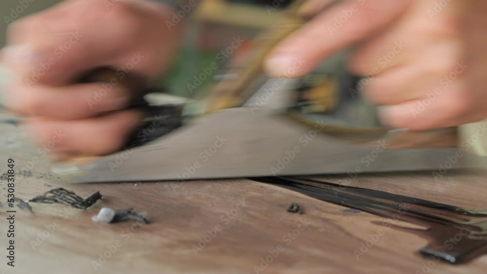 woodworker makes furniture on the workshop woodworker makes furniture on the workshop