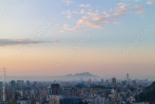 Sunset aerial view of the cityscape of Wenshan District of Taipei from Xianjiyan