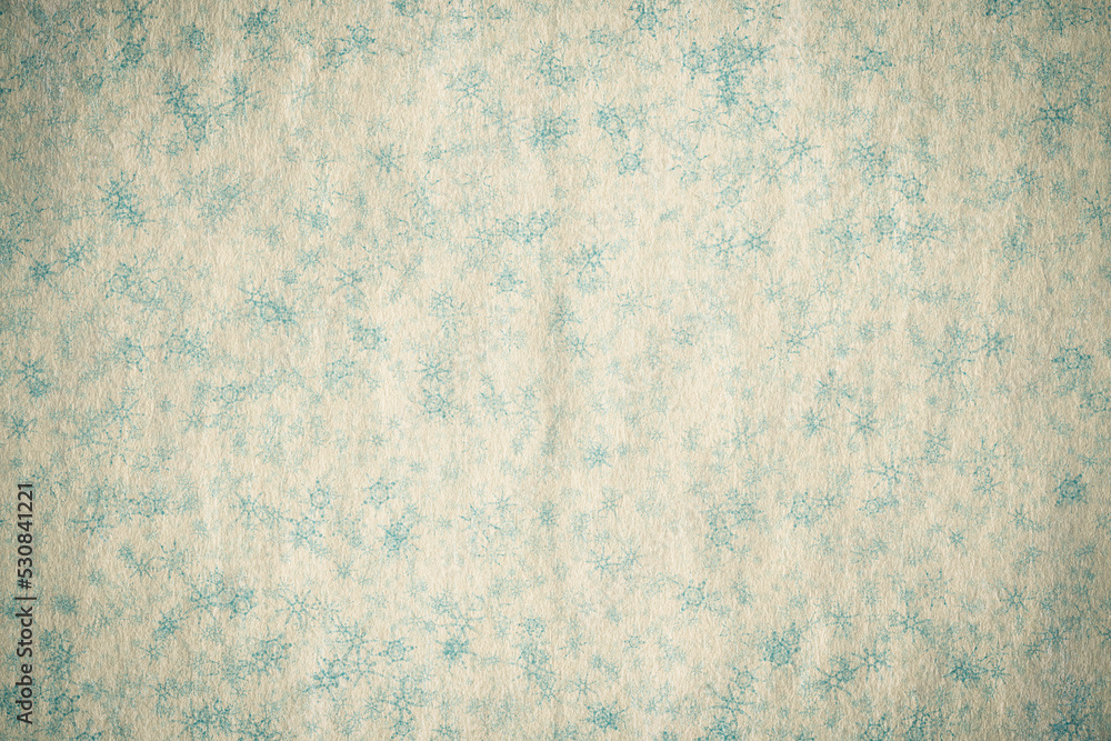 Fototapeta premium snowflakes on paper texture