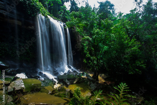 Jungle waterfall cascade in tropical rainforest.