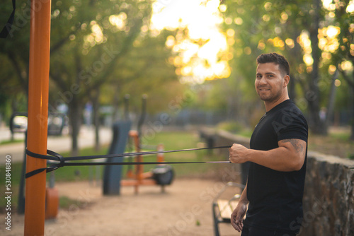 young man exercising in a park