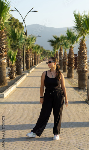 Portrait of a young beautiful girl on a sunny day